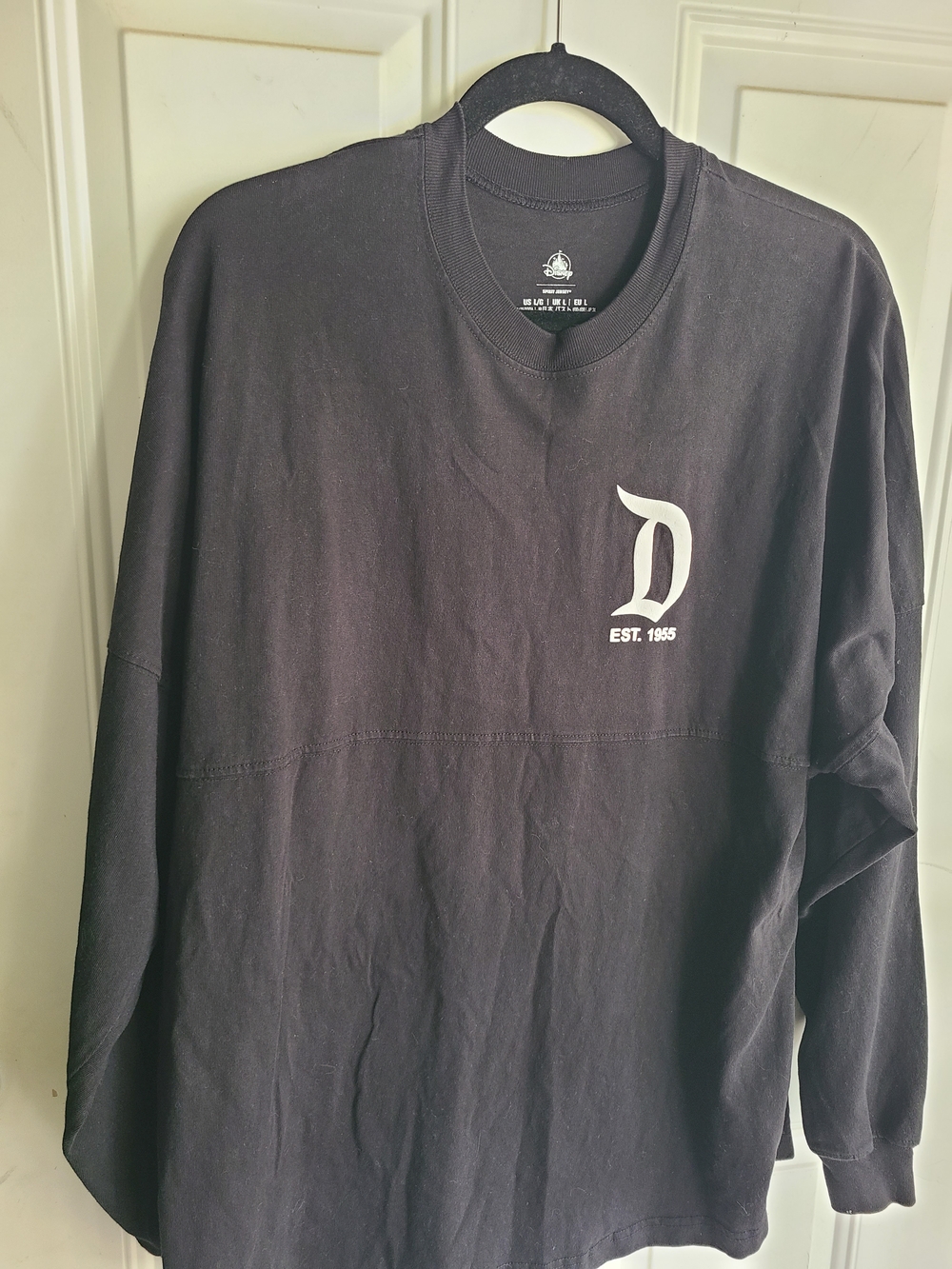 Disney Black Long Sleeve Tee with White 'D' Chest Logo